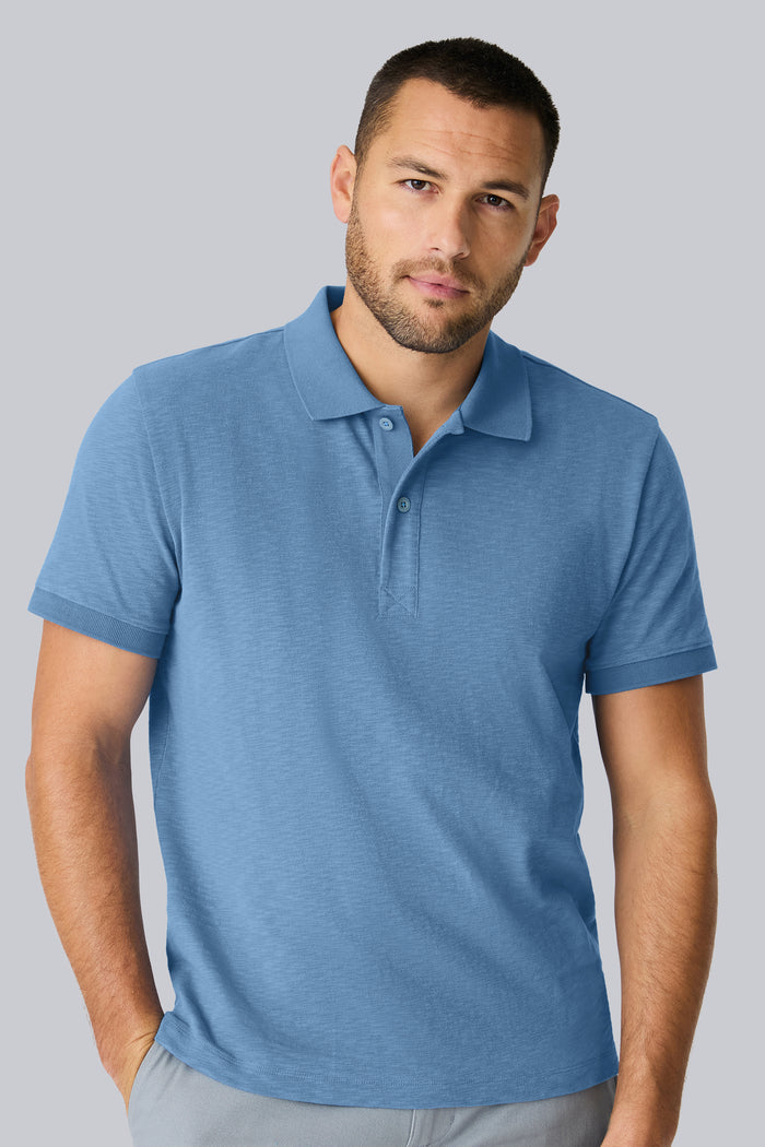 Front view of a man wearing Heavyweight Slub polo in Dean Blue
