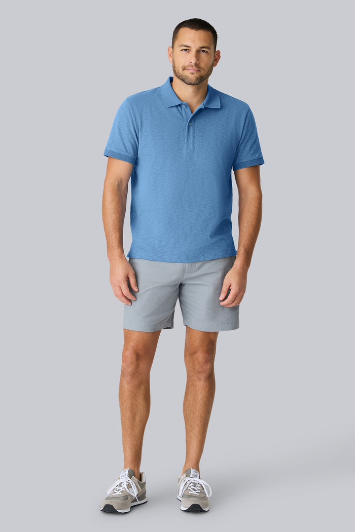 Full front view of a man wearing Heavyweight Slub polo in Dean Blue