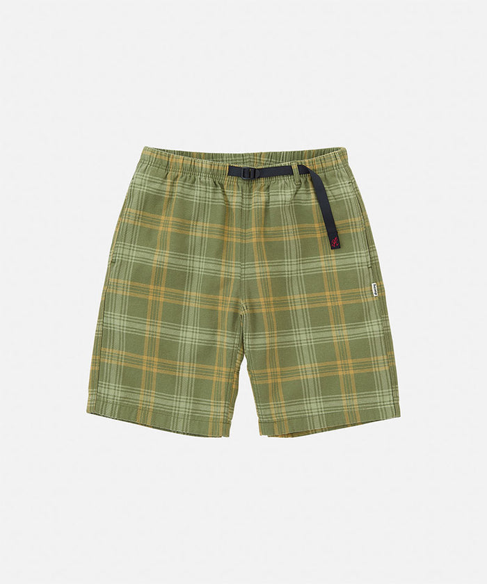 Olive plaid Gramicci Hemp G-Short Plaid with a belt against a light-tone background.