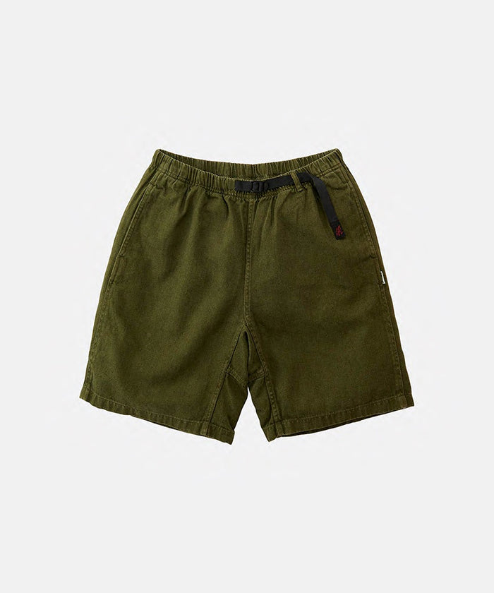 Hemp olive colored Gramicci Hemp G-Shorts with a belt against a light-tone background.