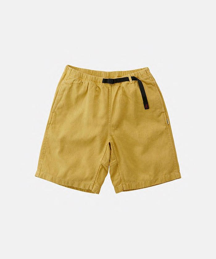 Hemp yellow Gramicci Hemp G-Shorts with a belt against a light-tone background.