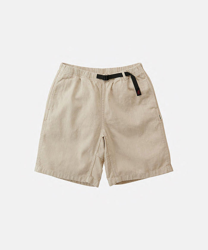Hemp stone colored Gramicci Hemp G-Shorts with a belt against a light-tone background.