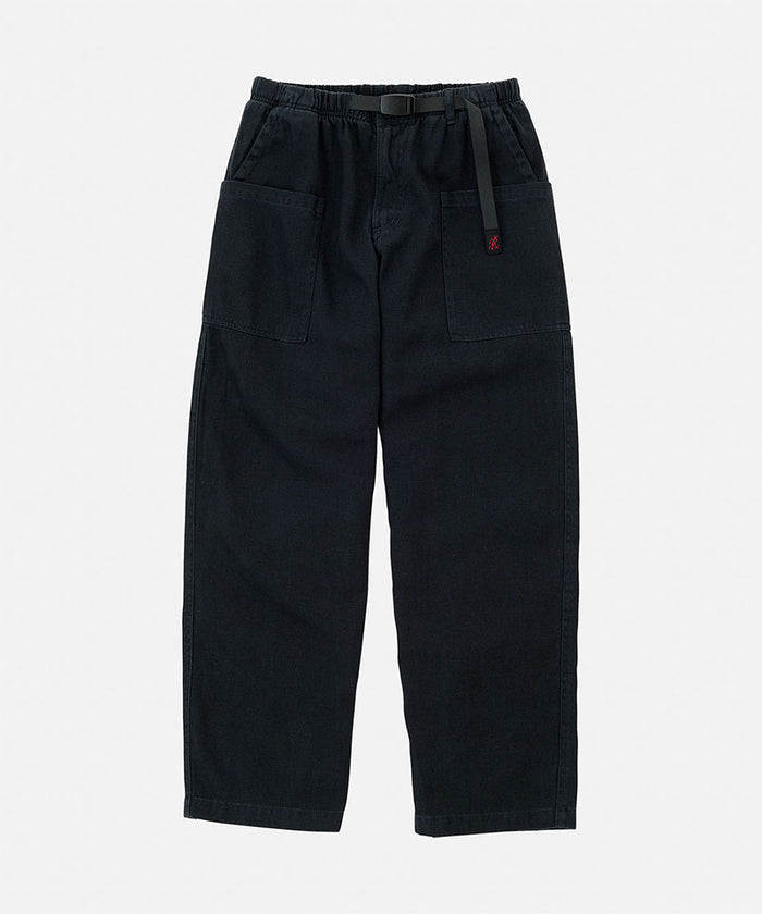 Carbon colored Gramicci Hemp Relaxed Pants with a belt against a light-tone background.