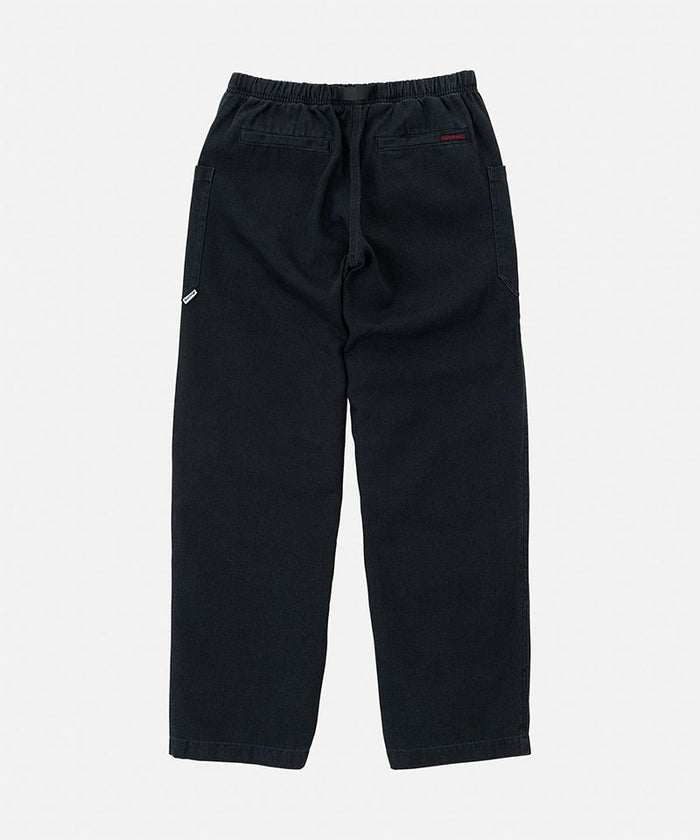 Back view of carbon colored Gramicci Hemp Relaxed Pants on a light-tone background.