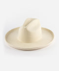 An off white western hat with a pencil brim and a tall crown, made of Australian wool. #color_off white