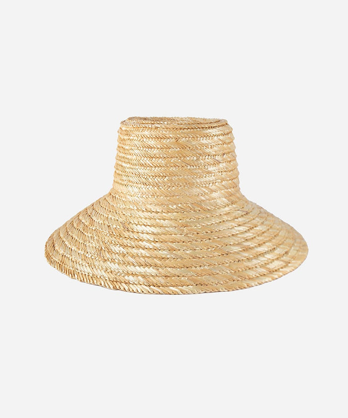 A natural colored straw boater hat with a wide brim against a plain background #color_natural