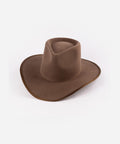 A chocolate colored felt Western hat with a teardrop-shaped crown and an angled brim, bound with a tonal grosgrain ribbon around the brim edge. #color_chocolate