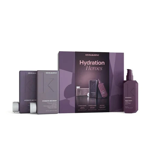 Kevin Murphy Hydration Heroes hair care set featuring a purple and gray box, two rectangular bottles, and a spray bottle on a white background.