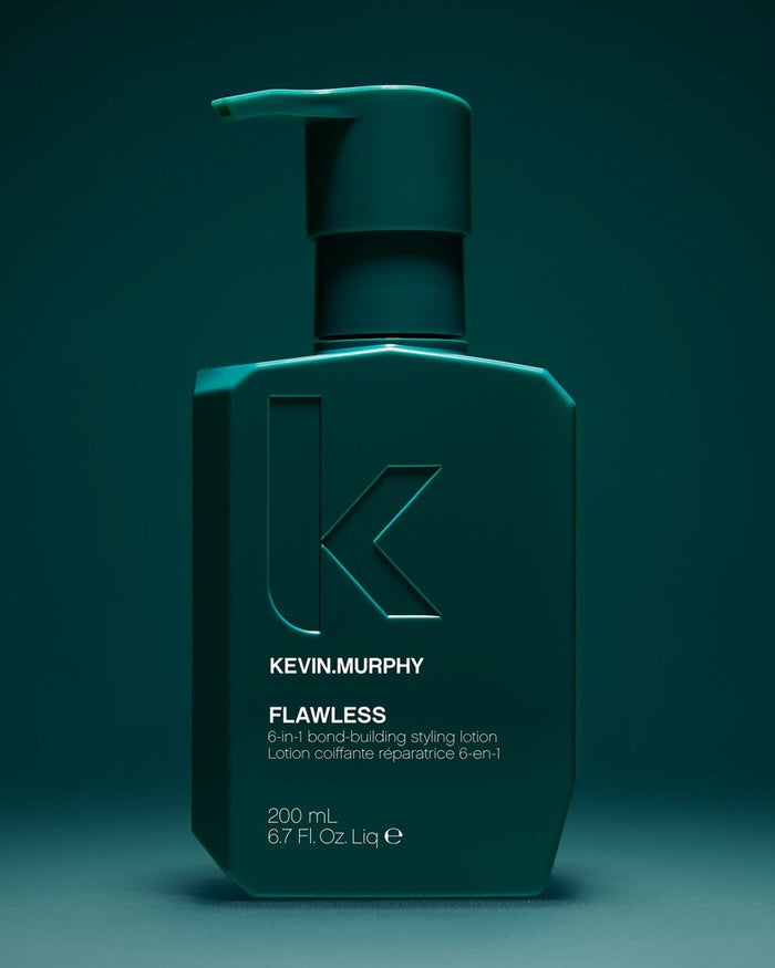 Kevin Murphy Flawless 6-in-1 hairbuilding styling lotion in a matte dark teal-green pump bottle, set against a matching dark teal background - Hair Care Canada