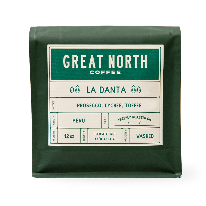 Close-up of a dark green La Danta coffee bag with Great North Coffee branding and origin notes