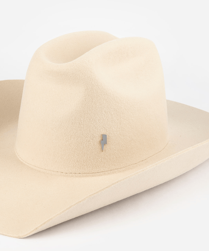 Pink cowboy hat with a silver lightning bolt-shaped hat pin on a white background #color_silver