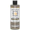Retique It Liquid Wood Wood'n Stain in Weathered Wood, 8 oz, showing the stain applied to a wooden surface.