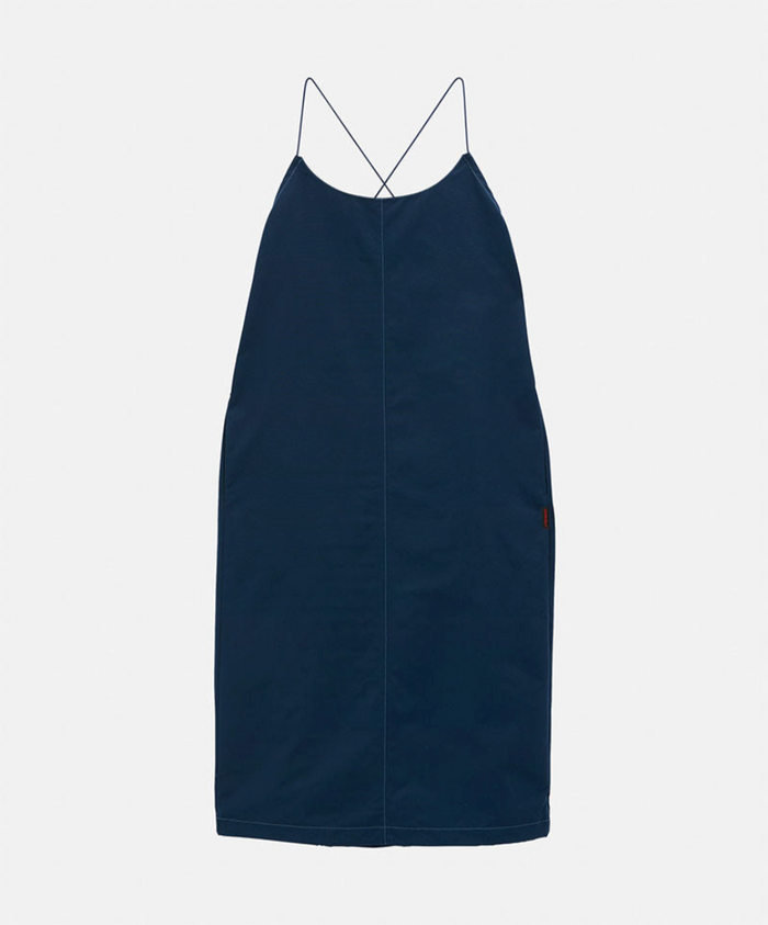 A navy blue sleeveless slip dress with thin double spaghetti straps, shown against a light-tone background.