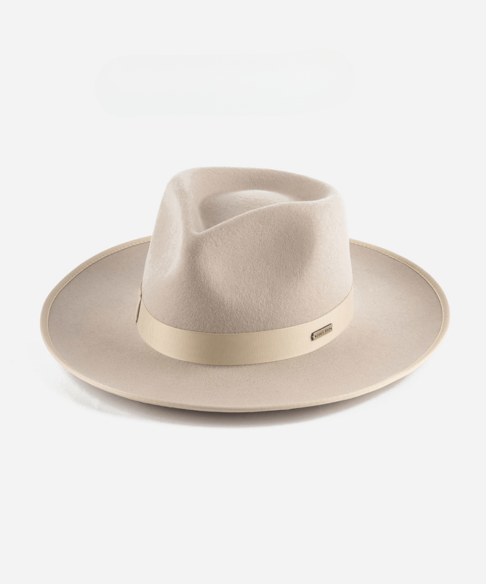An ivory colored fedora hat with a band on a white background #color_ivory