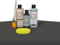 Retique It refinishing kit with Light Wood primer, Charcoal gel stain alternative, matte Tripletique topcoat, a brush and yellow sponge.