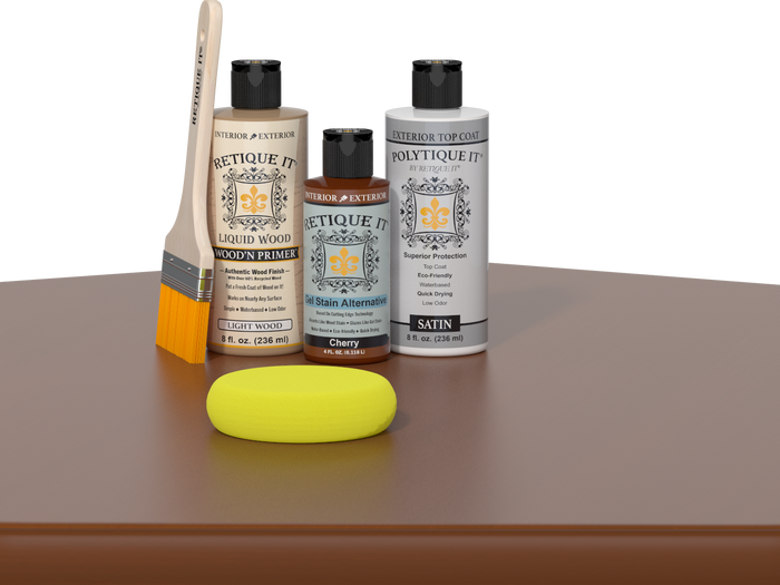 Retique It® Light Wood Wood’n Primer with Cherry Gel Stain Alternative, satin topcoat, brush, and yellow sponge on a tabletop.