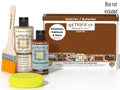 Retique It® Cherry Multipurpose Kit with box not included, primer, Cherry Gel Stain Alternative, brush, and yellow sponge on a brown tabletop.