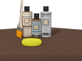 Retique It refinishing kit with Light Wood primer, Dark Oak gel stain alternative, matte Polytique It topcoat, a brush and yellow sponge.