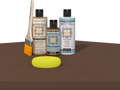 Retique It refinishing kit with Light Wood primer, Dark Oak gel stain alternative, matte Tripletique topcoat, a brush and yellow sponge.
