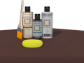 Retique It refinishing kit with Light Wood primer, Red Mahogany gel stain alternative, matte Polytique It topcoat, a brush and yellow sponge.