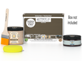 Retique It® Black Walnut Brush-On Kit shown with the Black Walnut Multipurpose Kit box, brush, Light Wood primer, Black Walnut Gel Stain Alternative, and a yellow sponge.