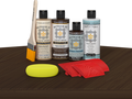 Retique It® Black Walnut Wood'n Kit with Matte TripleTique® includes a brush, Light Wood primer, Black Walnut stain, Black Walnut Gel Stain Alternative, Matte TripleTique® top coat, a yellow sponge, and a red graining tool.