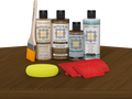 Retique It® Dark Pecan Wood'n Kit with Light Wood primer, Dark Pecan stain, Pecan gel stain alternative, Matte Tripletique® Top Coat, brush, red graining tool, and yellow sponge.