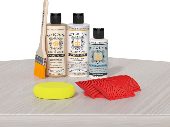 Retique It Wood'n Finish Kit in White Wash, a multi-purpose wood finish kit with brushes and applicators on a table.