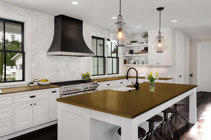 Retique It Wood'n Kit in Dark Pecan for wood finishing, shown on a kitchen countertop with application tools and wood surface.