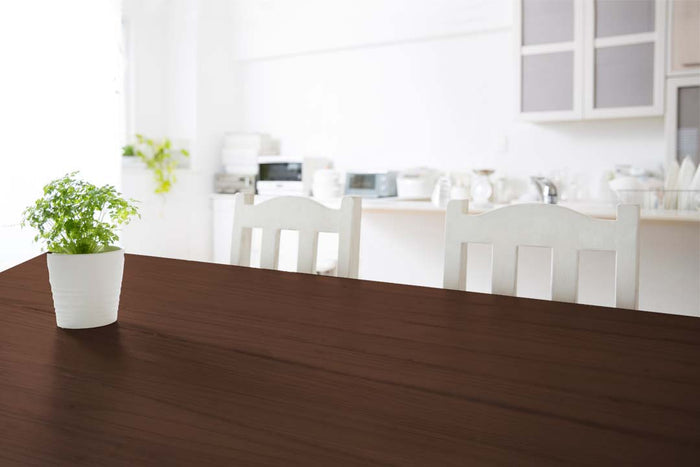 Retique It Wood'n Kit for Java interior top coat, showing a finished wooden tabletop with smooth, polished surface and natural wood grain.