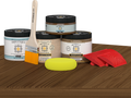 Multi-purpose Wood'n Kit in Modern Walnut by Retique It on a table, featuring interior topcoat for wood finishing projects.