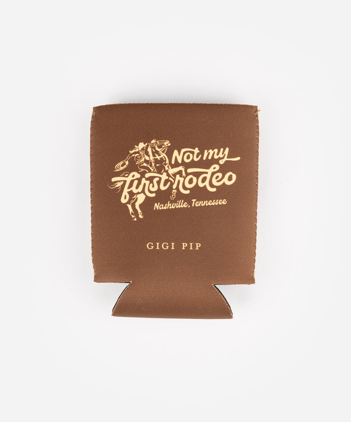 Brown can sleeve with 'Not my first rodeo' text and 'GIGI PIP' branding on a white background #color_brown