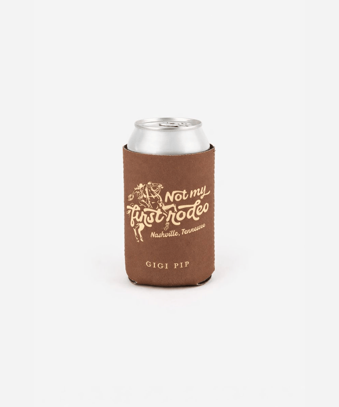 Brown can sleeve on a can with 'Not my first rodeo' text and 'GIGI PIP' branding on a white background #color_brown