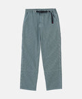 Navy Gramicci Overdyed Hickory Work Pants with a belt against a light-tone background.