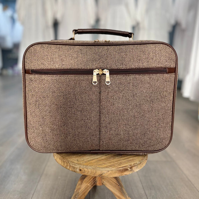 Brown briefcase bag.