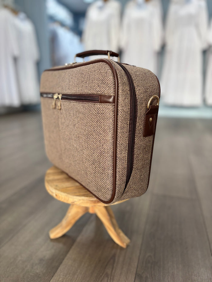 Brown briefcase bag.