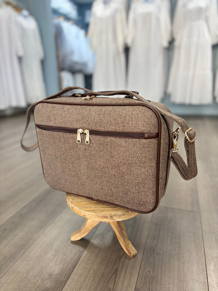 Brown briefcase bag.