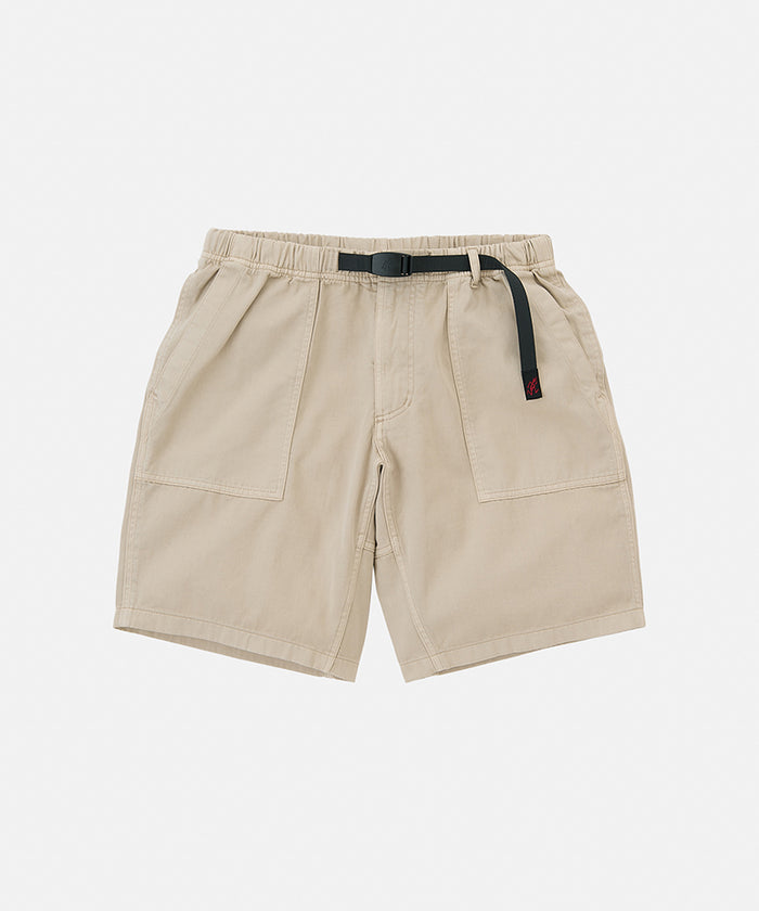 Sand pigment colored Gramicci Ridge Short with a belt against a light-tone background.