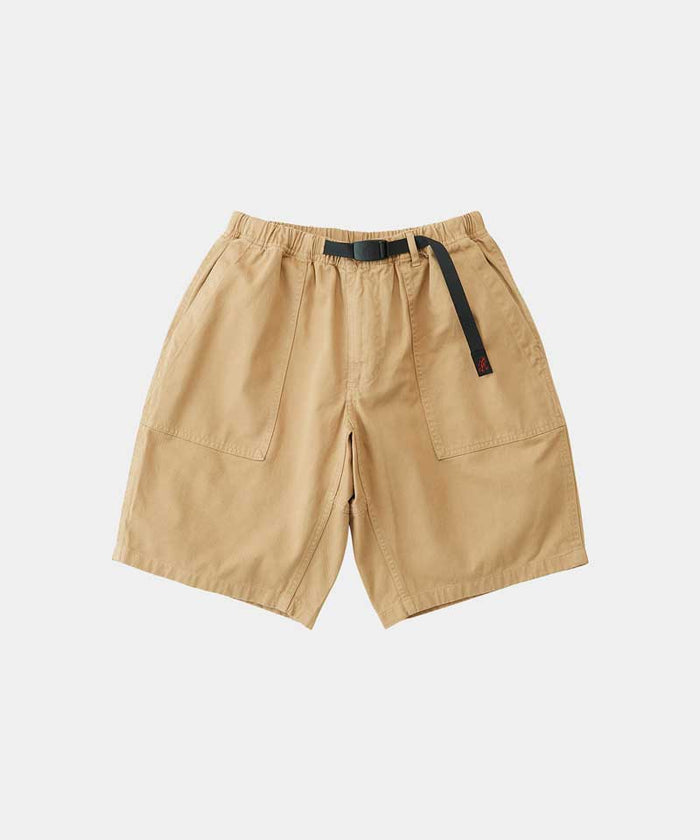 Chino colored Gramicci Ridge Short with a belt against a light-tone background.