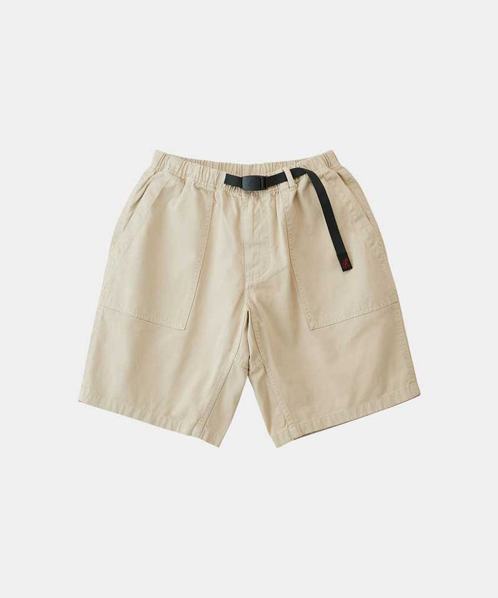Chino colored Gramicci Ridge Short with a belt against a light-tone background.