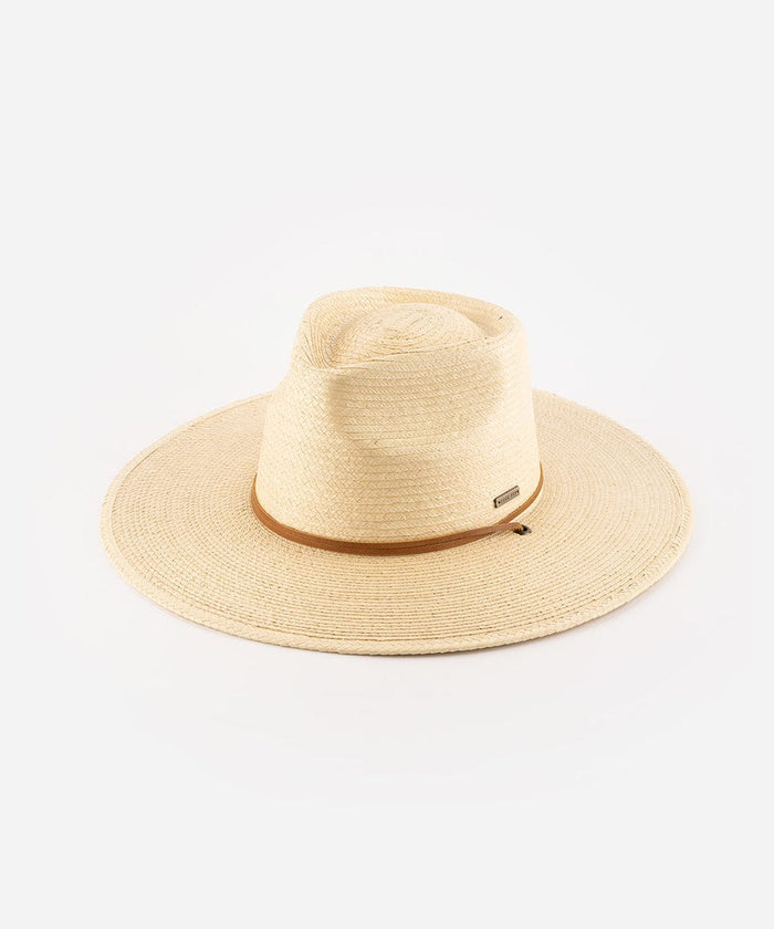 An ivory colored palm straw sun hat with a teardrop fedora crown and a wide flat brim, featuring a brown genuine leather chinstrap. #color_ivory