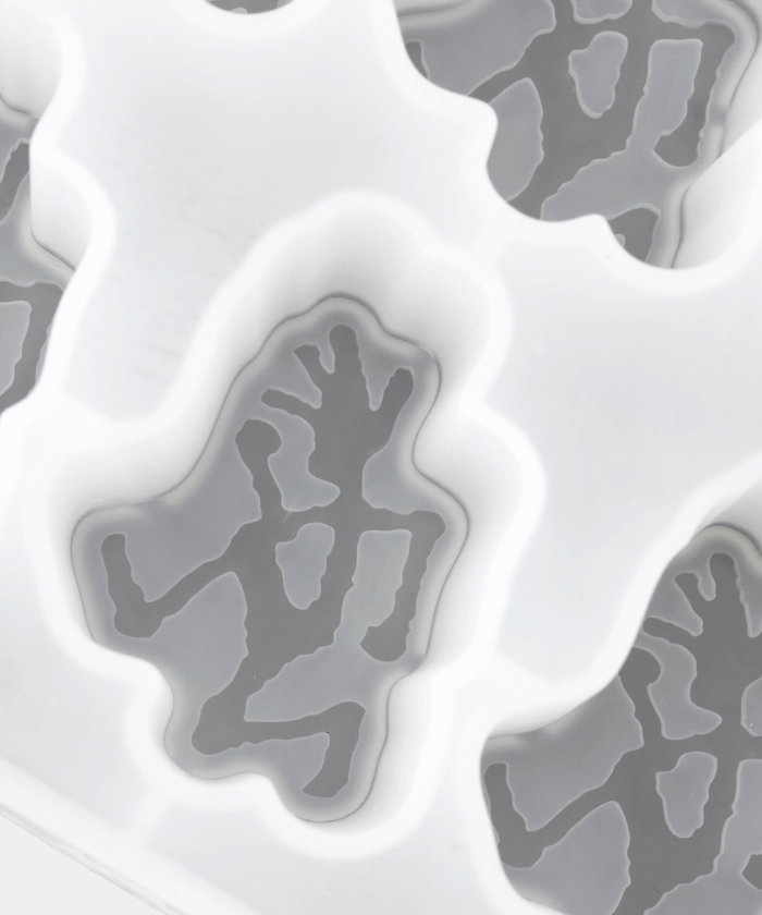 Silicone mold with gray silicone parts on a white background, branded 'Gramicci'.