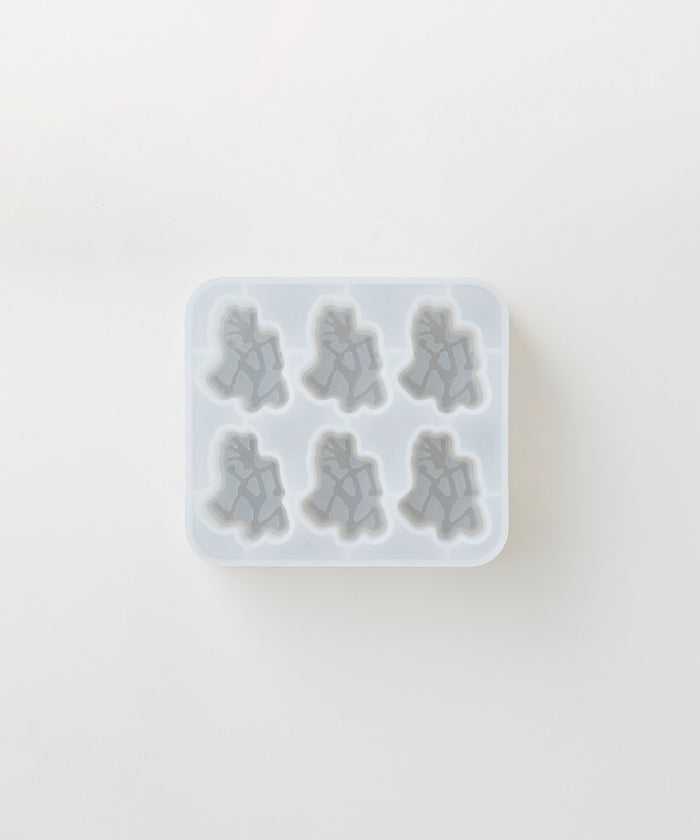Gramicci Running Man Ice Cube Tray on a light-tone background.