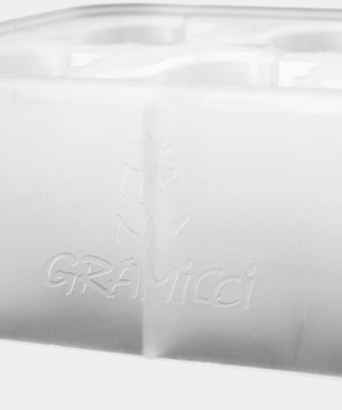 Silicone mold with gray silicone parts on a white background, branded 'Gramicci'.