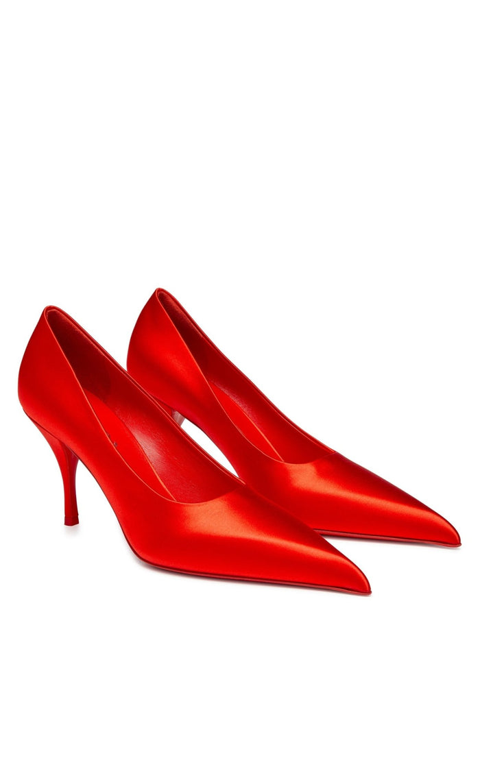 Leather sole of Prada red satin heels with logo plaque made in Italy