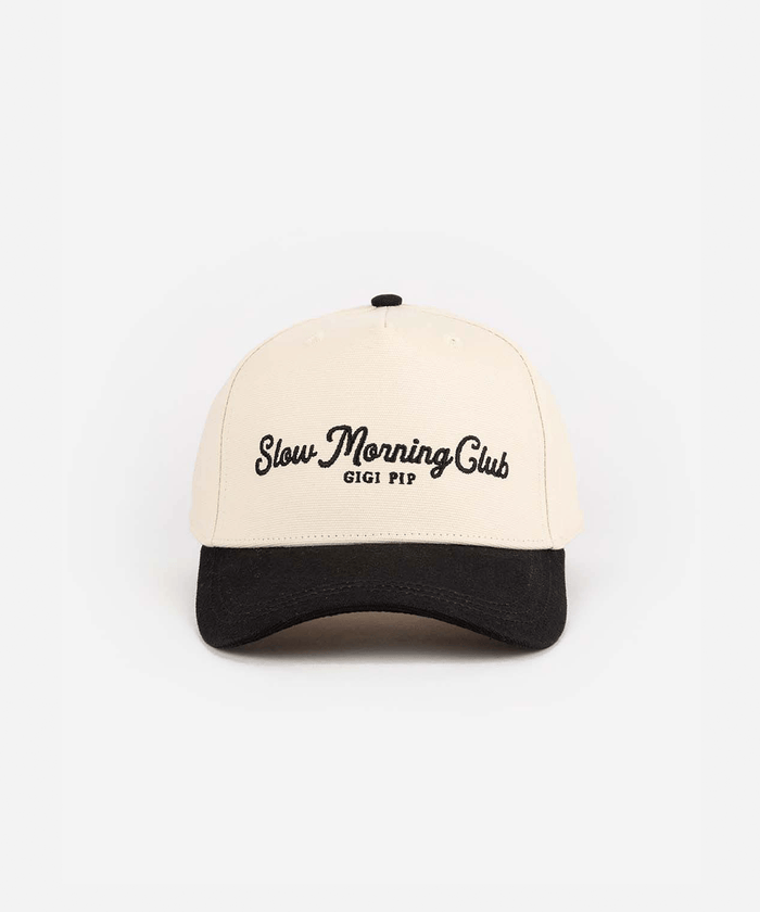 A cream and black cap with the text "Slow Morning Club", on a plain background #color_cream - black