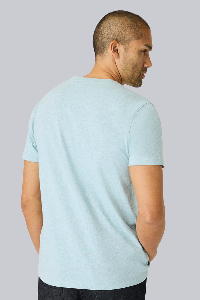 Back view of a man wearing Slub Crew Neck T-Shirt in Nile Blue Heather