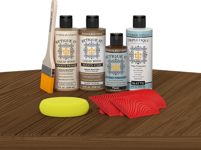 Retique It® Barn Wood Wood'n Kit with Light Wood Primer, Barn Wood Wood'n Stain, Matte TripleTique Top Coat, Pecan Gel Stain Alternative, yellow sponge, red graining tool, and brush.