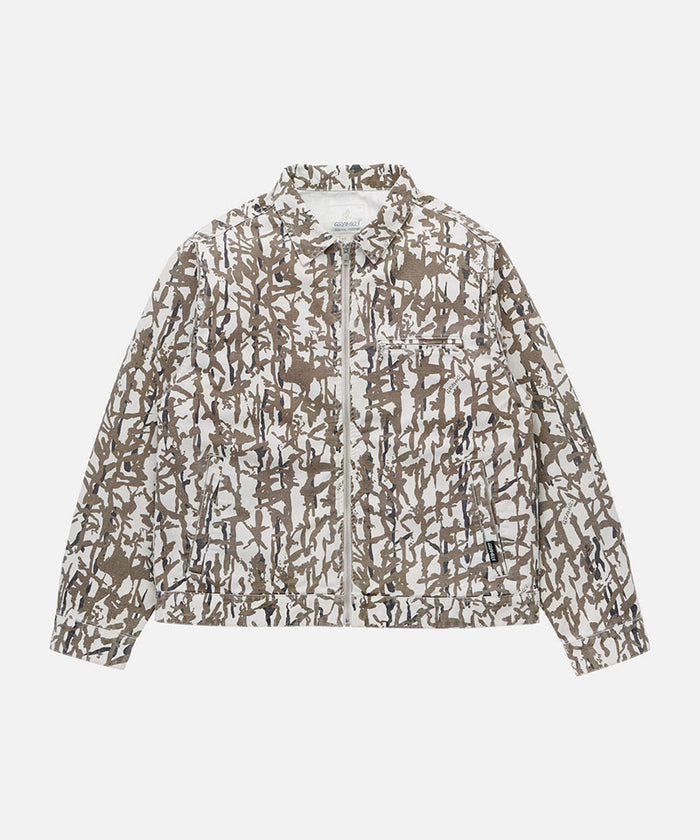 Gramicci grey reed camouflage Taos Canvas Jacket against a light-tone background.