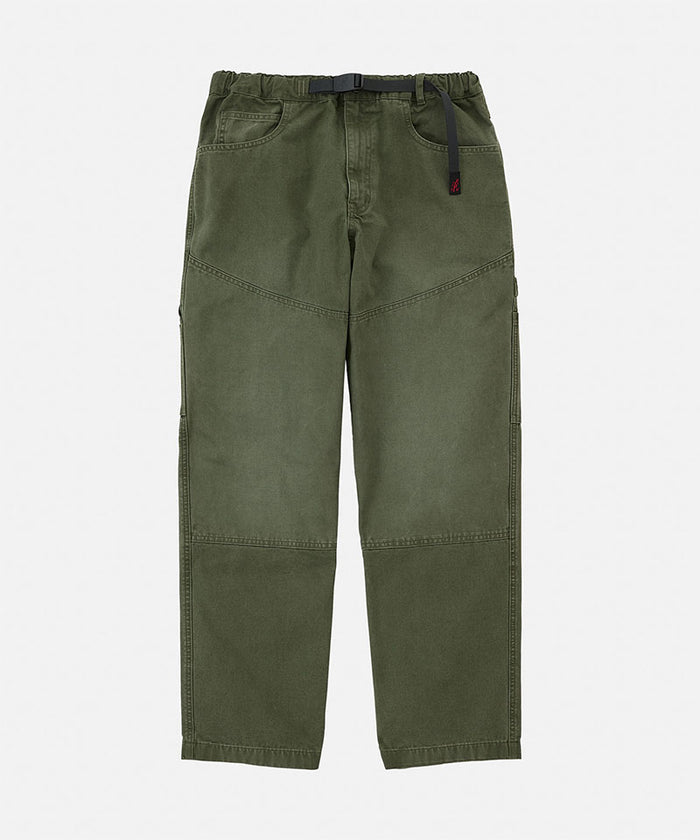 Moss colored Gramicci Taos Canvas Pant with a belt against a light-tone background.